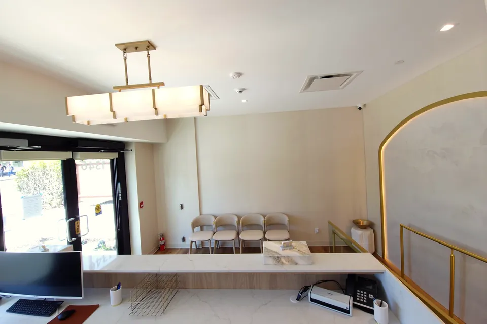 Reception desk and front-of-house at Monaco Dentistry, White Rock